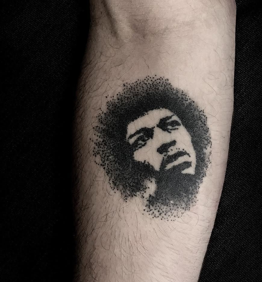 Dotwork tattoo of Jimi Hendrix by David on a friend's forearm