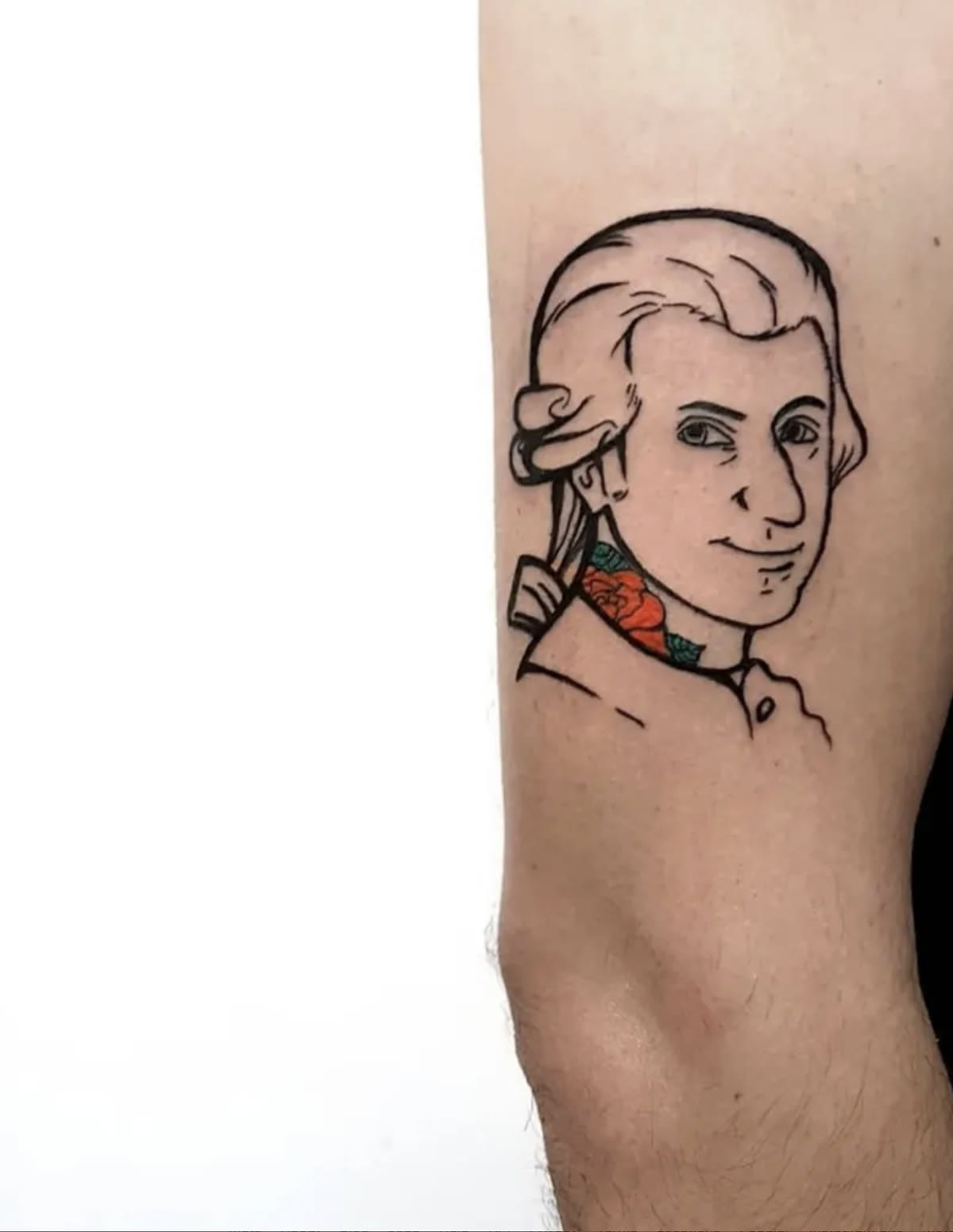 Mozart portrait tattoo by David, line work with a color rose at the neck