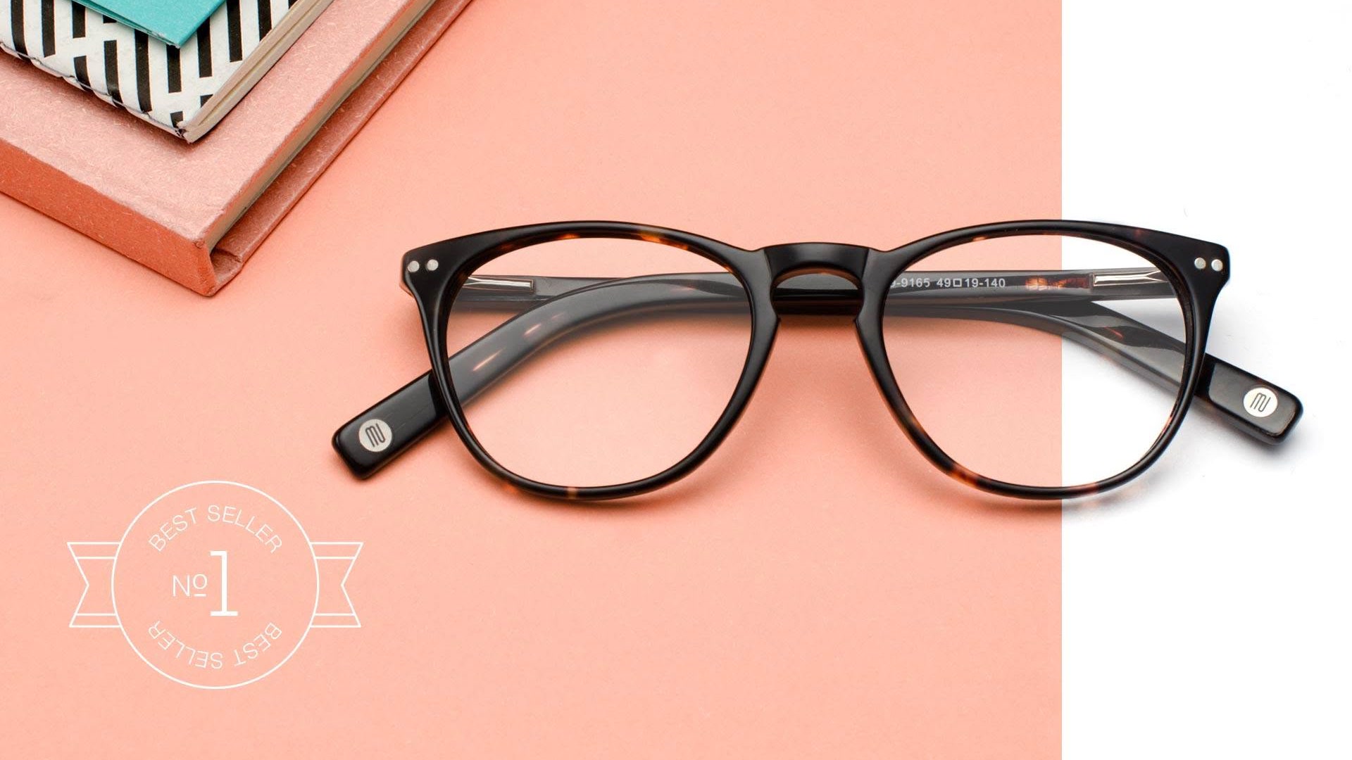 Muse best-seller tortoise frame photographed on the coral brand background