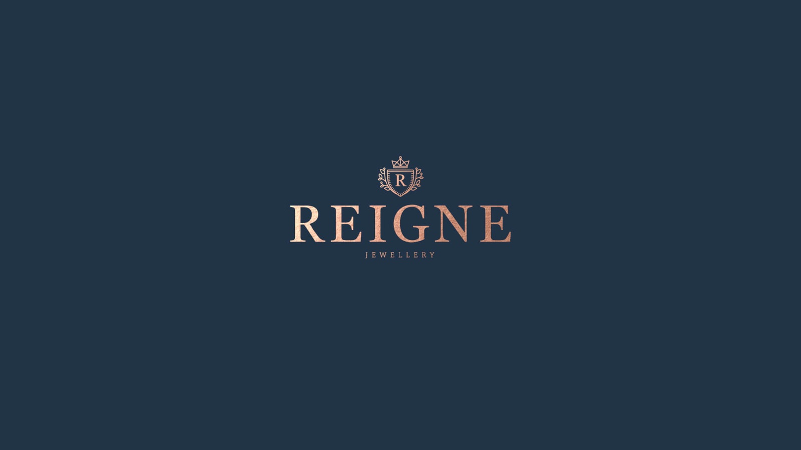 Reigne logo on a dark background